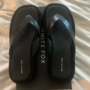 Size 7 black white fox platform sandals